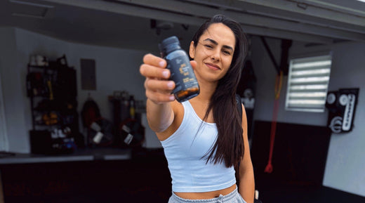 Ariane Lipski holding a bottle of NMN